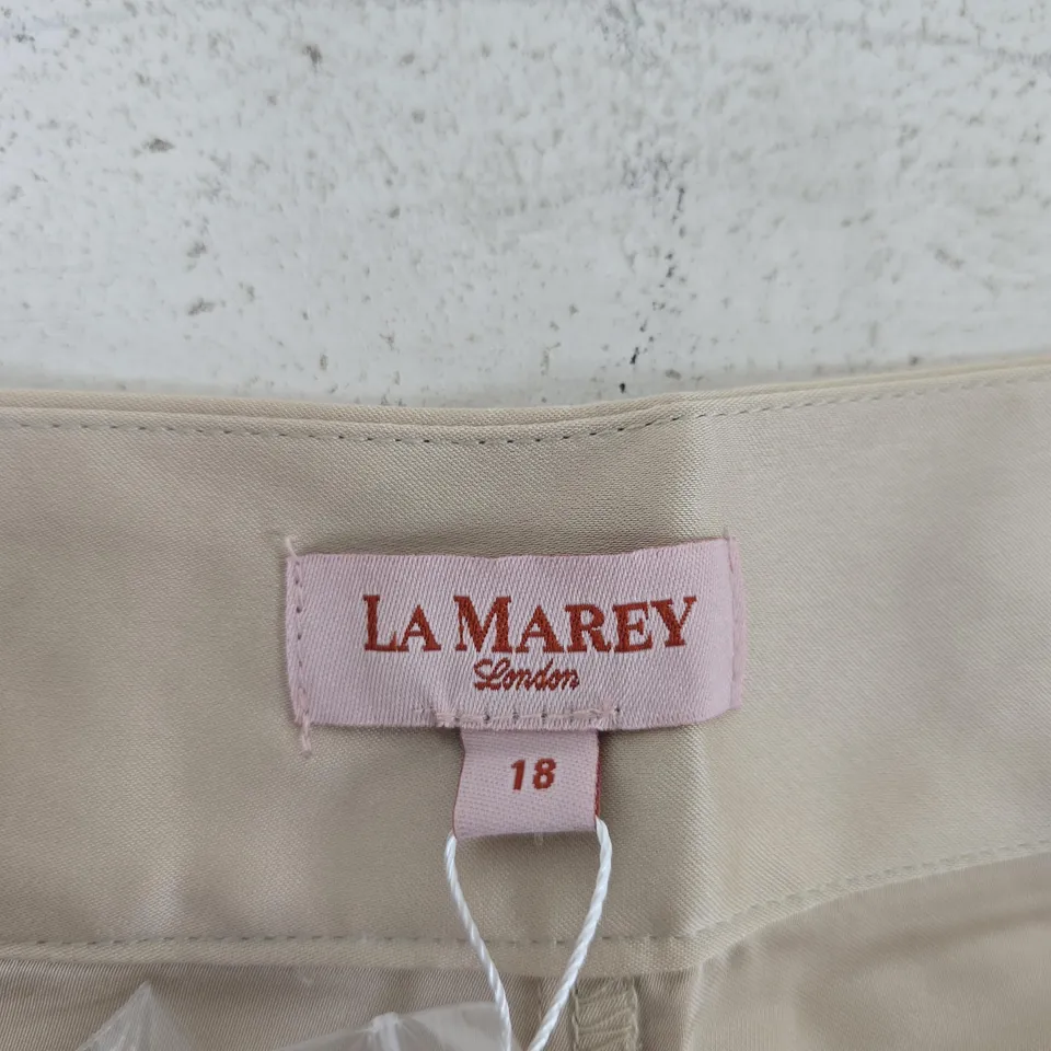 BOX OF APPROXIMATELY 45 LA MAREY CREAM PANTS 