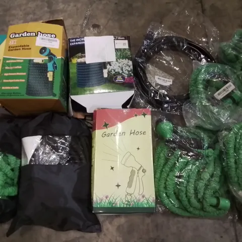 PALLET OF ASSORTED GARDEN HOSES AND FITTINGS