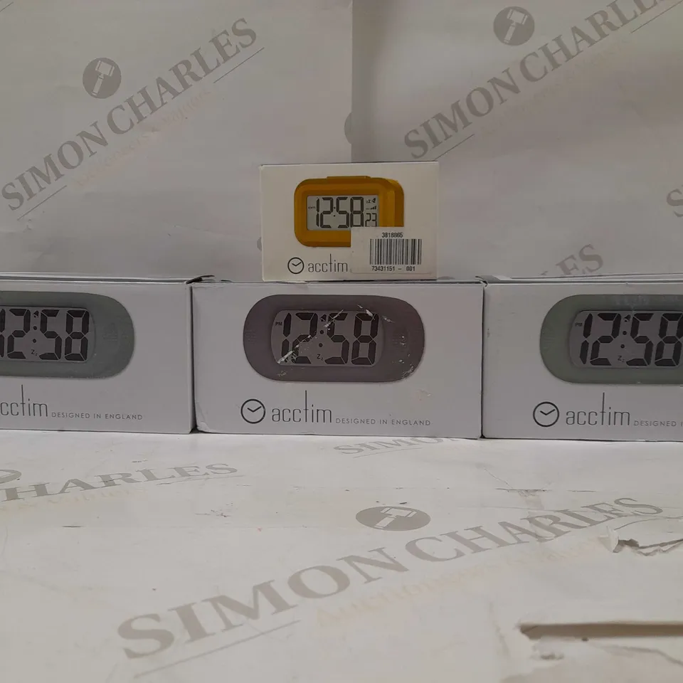 LOT OF APROX 4 ACCTIM DIGITAL CLOCKS