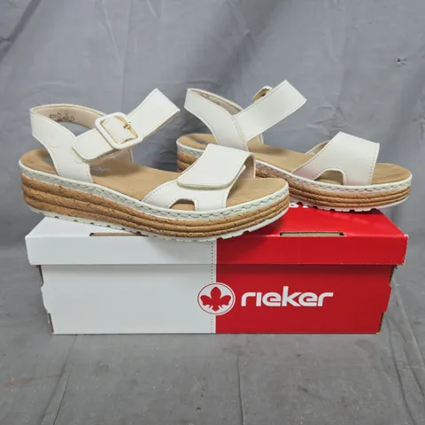 BOXED PAIR OF RIEKER DOUBLE STRAP FLATFORM SANDALS IN CREAM SIZE 6