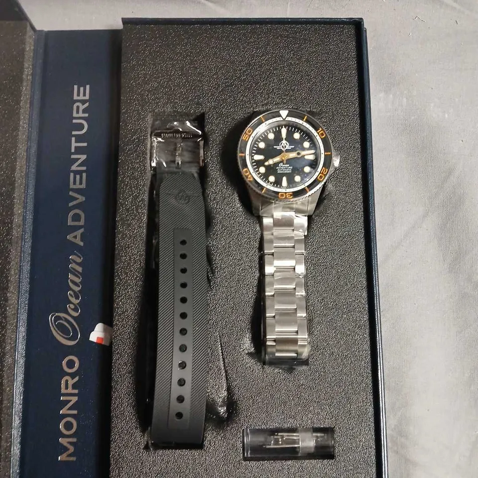 WRISTWATCH WITH ORANGE BEZEL AND STAINLESS STEEL BRACELET - MODEL UNSPECIFIED