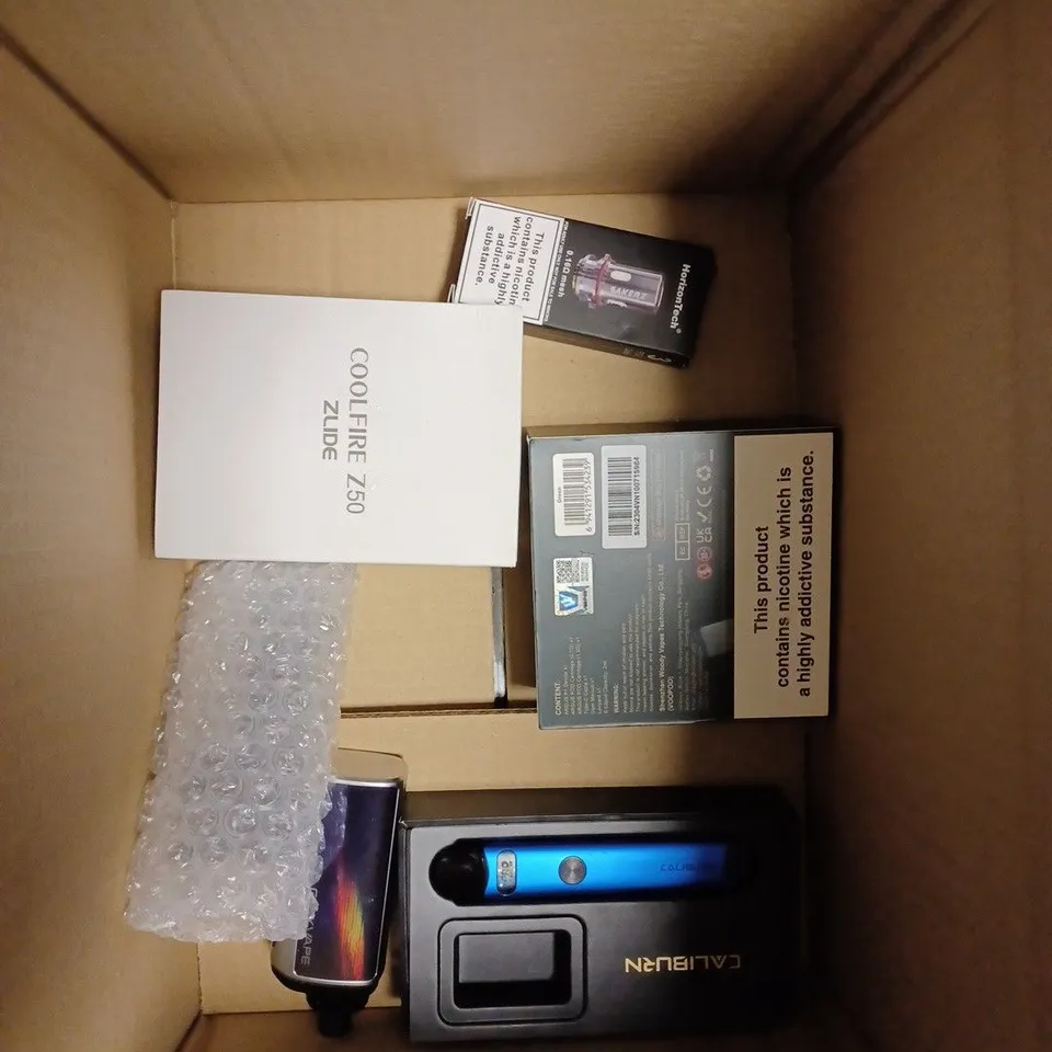 BOX OF APPROX 10 ITEMS TO INCLUDE OXVA XLIM SE, VOOPOO PNP-X POD TANK, LOST VAPE URSA NANO. 
