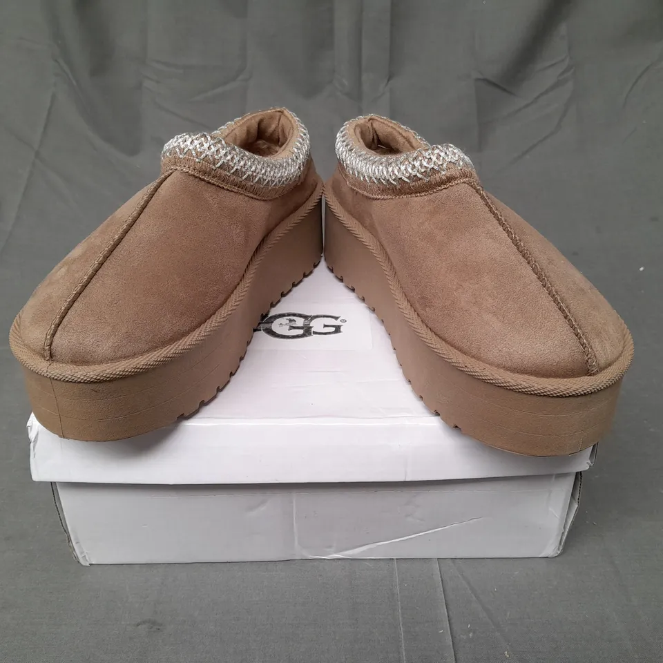 BOXED PAIR OF UGG SLIP ON SHOES IN LIGHT BROWN SIZE EU 36