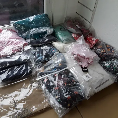 LARGE ASSORTMENT OF CLOTHING TO INCLUDE BOOHOO, JOE BROWN'S AND XISS