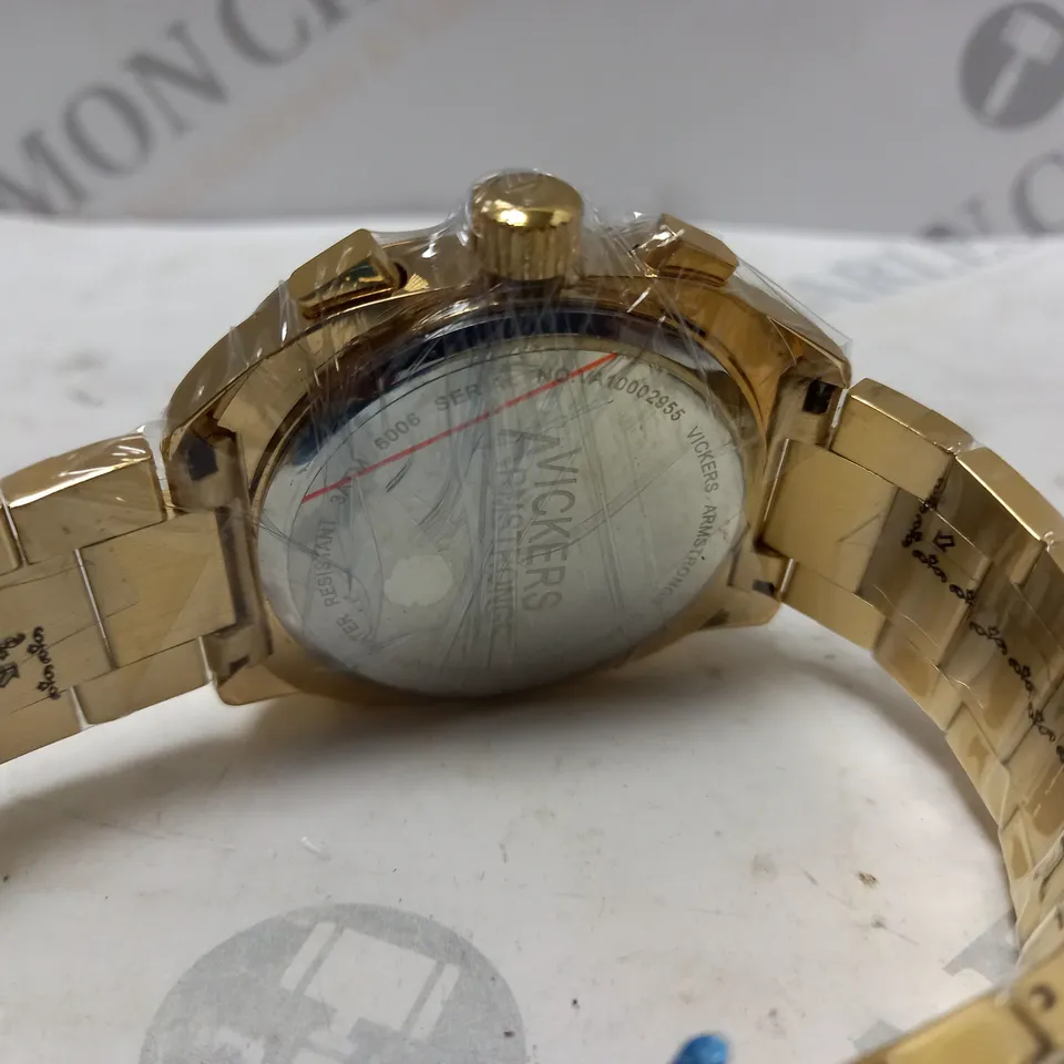 BOXED VICKERS ARMSTRONG CLASSIQUE GOLD WATCH WITH BLACK DIAL