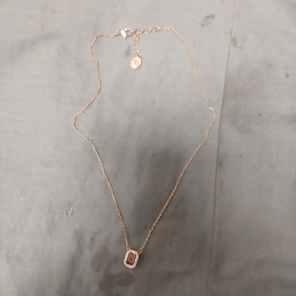 BOXED SWAROVSKI ROSE GOLD TONE NECKLACE WITH PINK STONE PENDANT