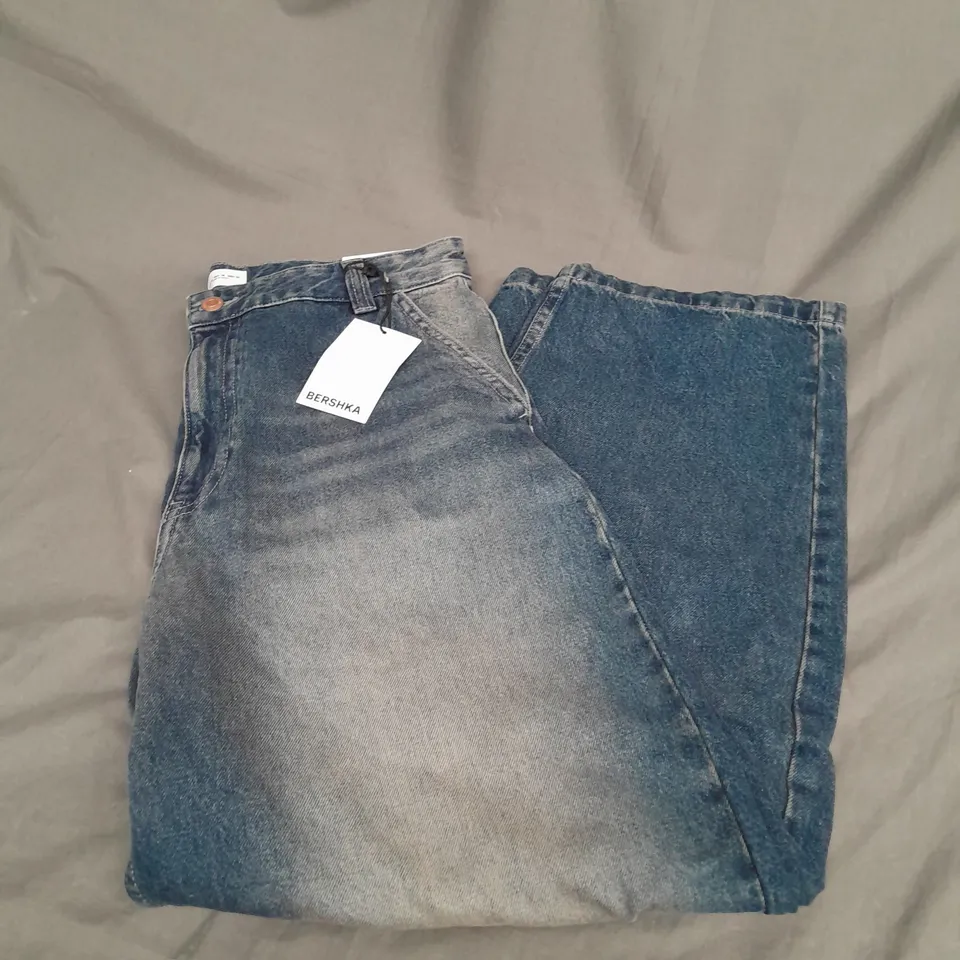 BERSHKA SKATER JEANS IN FADED BLUE SIZE 14