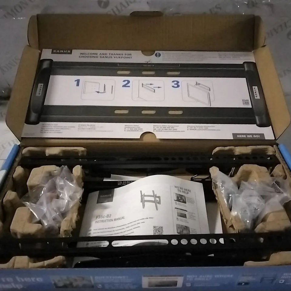 BOXED TILTING TV WALL MOUNT 