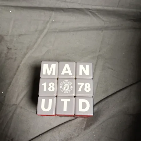 BOX OF APPROXIMATELY 10 ASSORTED TOYS INCLUDING ORIGAMI , DRGONBALL FIGURE AND MAN UNITED RUBIKS CUBE