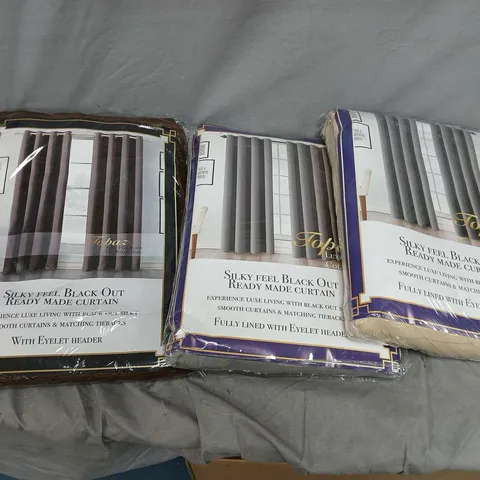 BOX OF APPROXIMATELY 6 TOPAZ BLACKOUT EYELET CURTAINS IN ASSORTED COLOURS TO INCLUDE - BEIGE - GREY - BROWN