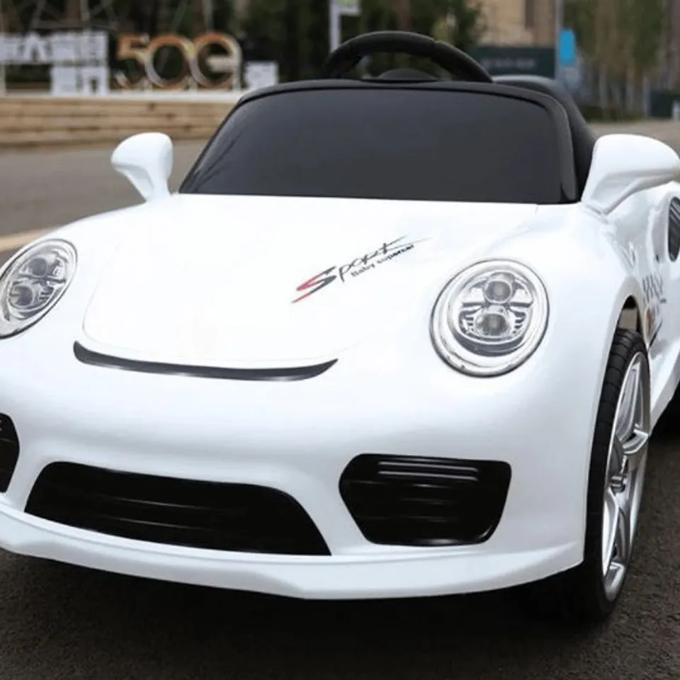 BRAND NEW BOXED KIDS PORSCHE STYLED 12V RIDE ON CAR WHITE