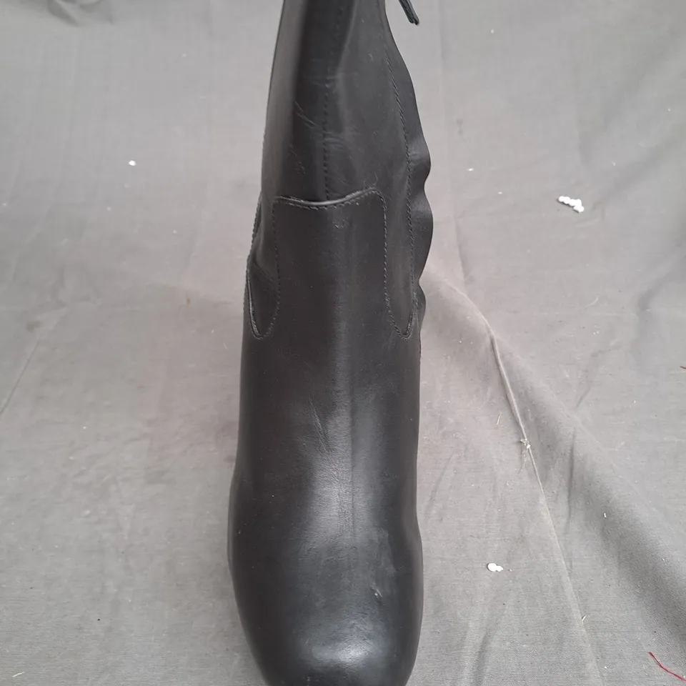 BOX OF APPROXIMATLY 5 WOODEN BOTTOM LEATHER BOOT VARIOUS SIZES 