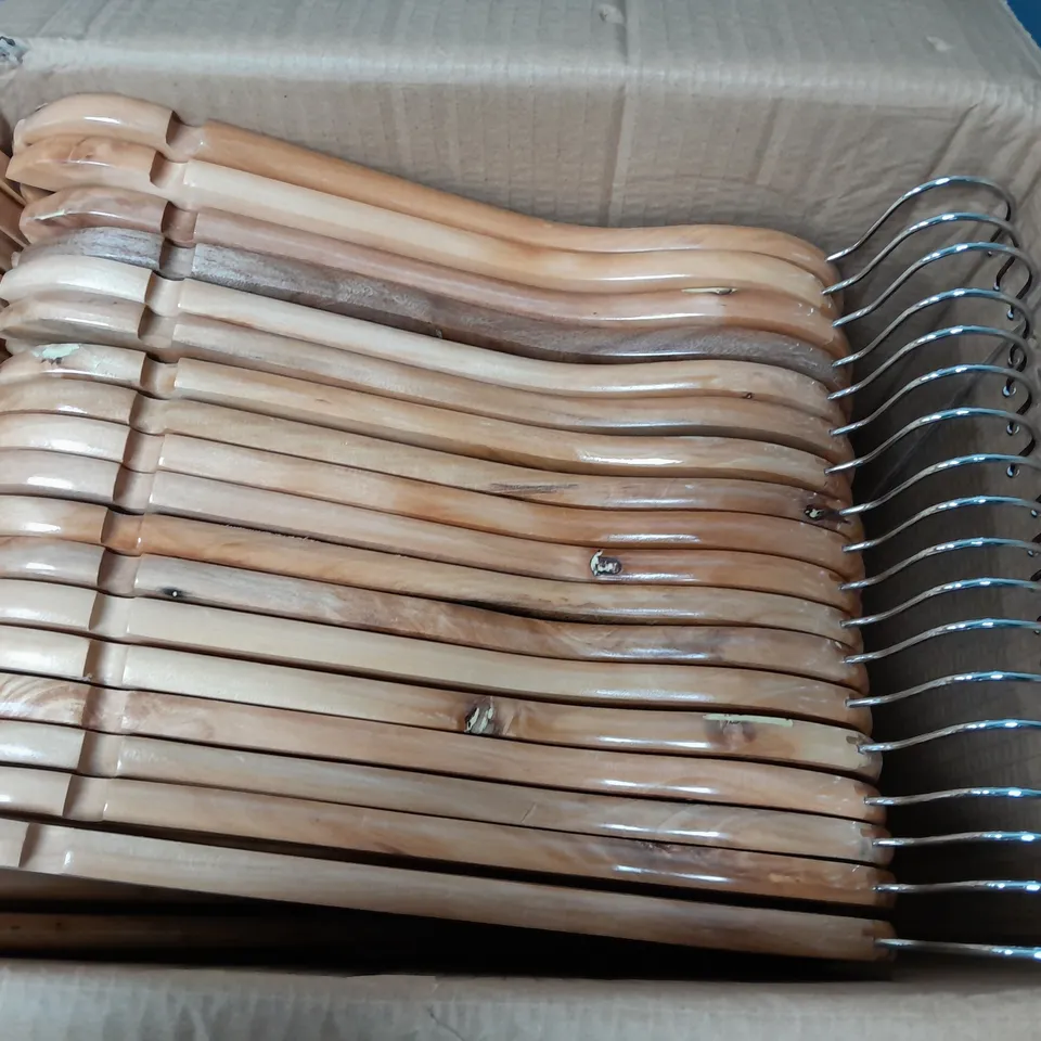 APPROXIMATELY 36 ASSORTED WOODEN COAT HANGERS