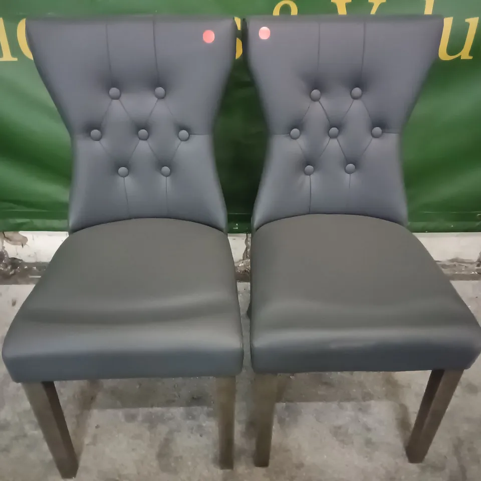 PAIR OF GREY FAUX LEATHER UPHOLSTERED DINING CHAIRS 