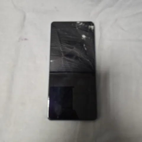 XIAOMI REDMI 5G SMARTPHONE – BLUE, REAR GLASS CRACKED