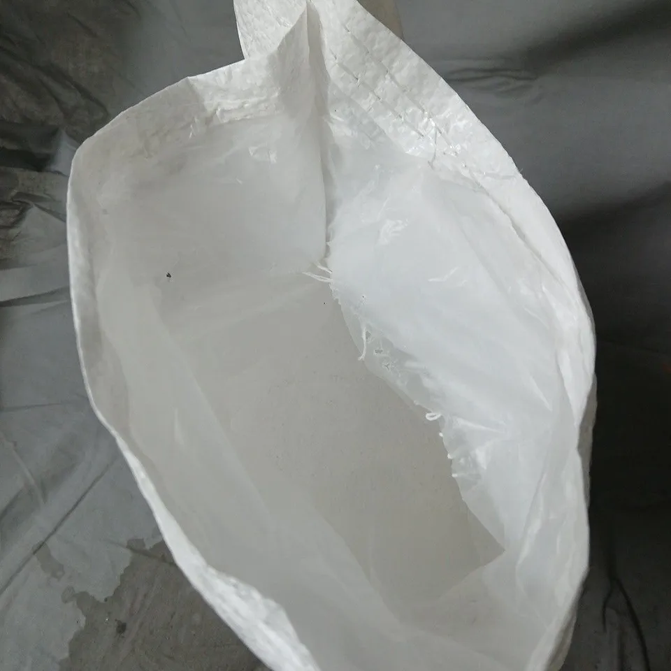LARGE BAG OF WASHING POWDER, BRAND NOT SPECIFIED