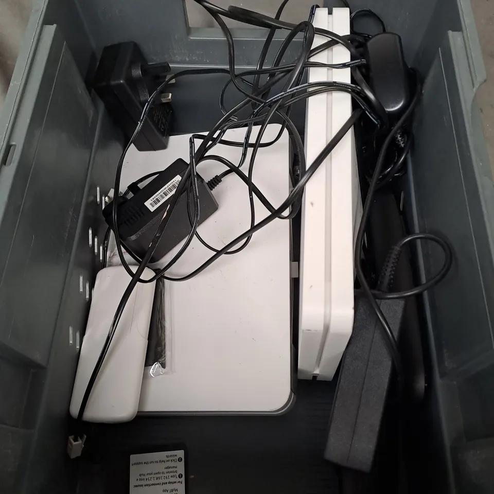 APPROXIMATELY 10 ASSORTED ELECTRICAL PRODUCTS TO INCLUDE ROUTERS, POWER SUPPLIES, REPLACEMENT REMOTES ETC 