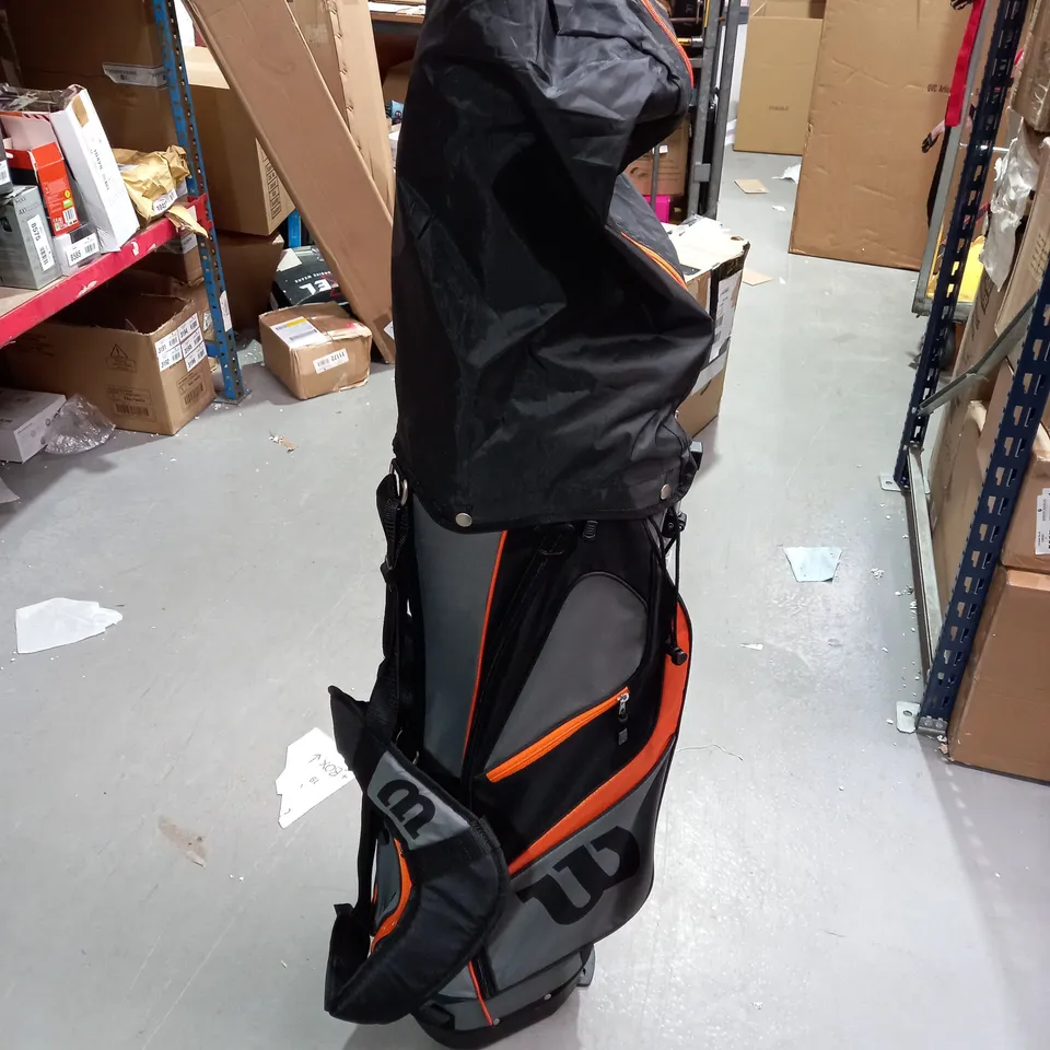 BOXED WILSON X31 GOLF BAG WITH APPROXIMATELY 10 GOLF CLUBS