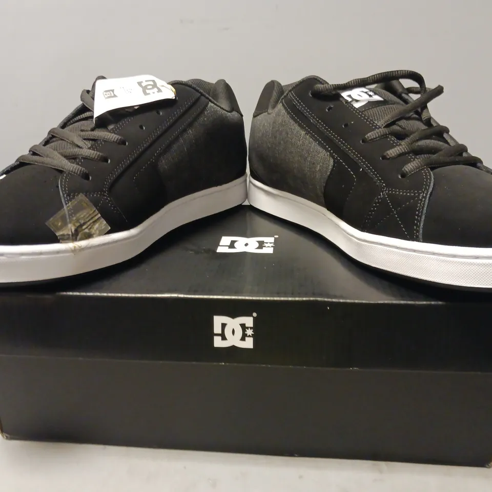 BOXED PAIR OF DC SHOES IN BLACK UK SIZE 11.5