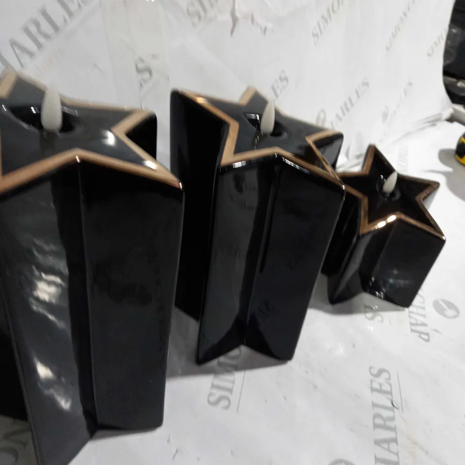HOME REFLECTIONS PORCELAIN STAR PRE-LIT CANDLES SET OF 3 - BLACK