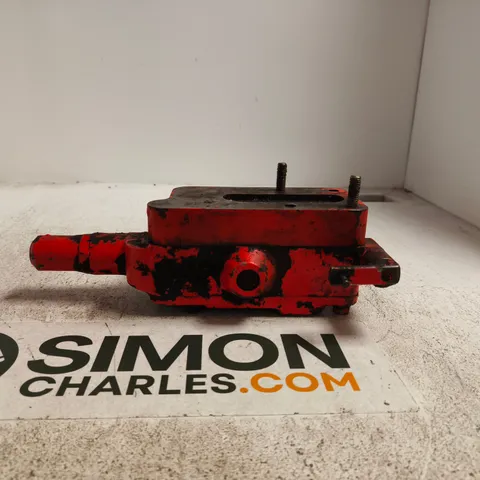 RED CAST-METAL HYDRAULIC CONTROL VALVE ASSEMBLY