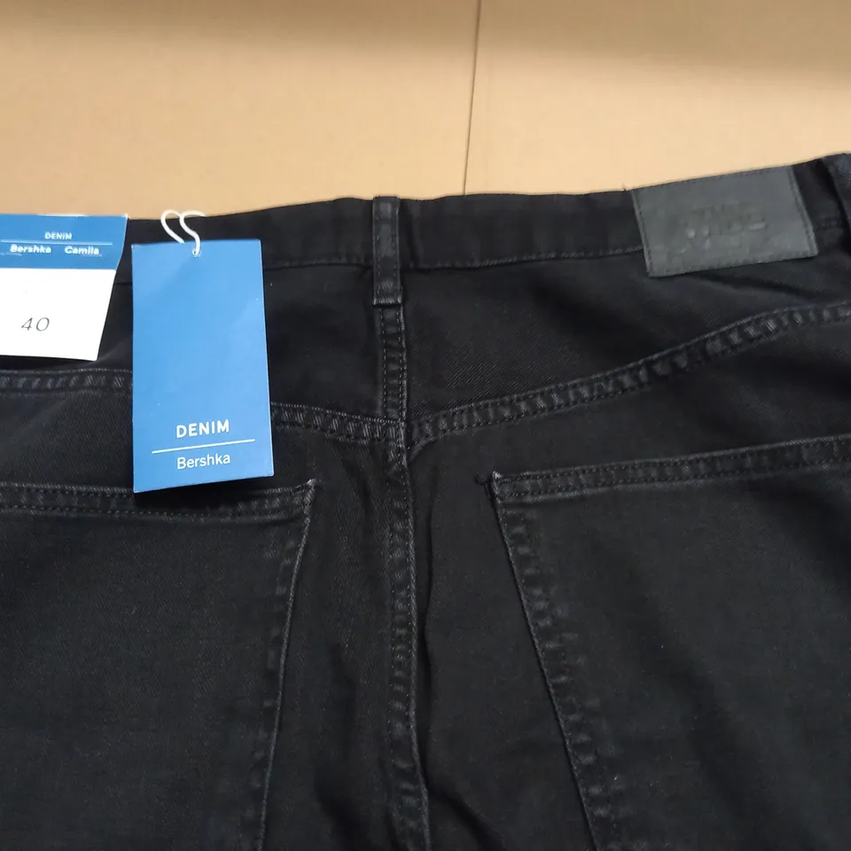 BERSHKA CAMILLA WIDE LEG PETITE JEANS - UK12