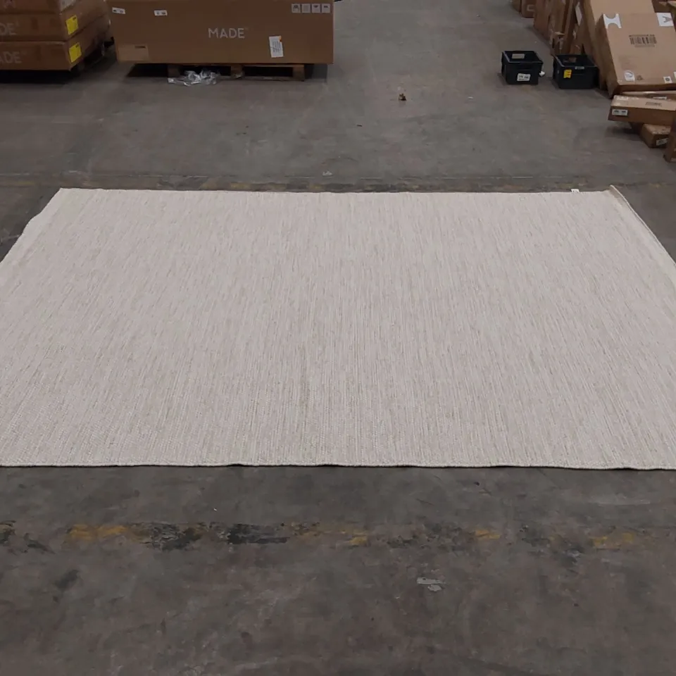 DEFREITAS HANDMADE FLATWEAVE RUG IN CREAM - APPROXIMATELY 345 x 238CM
