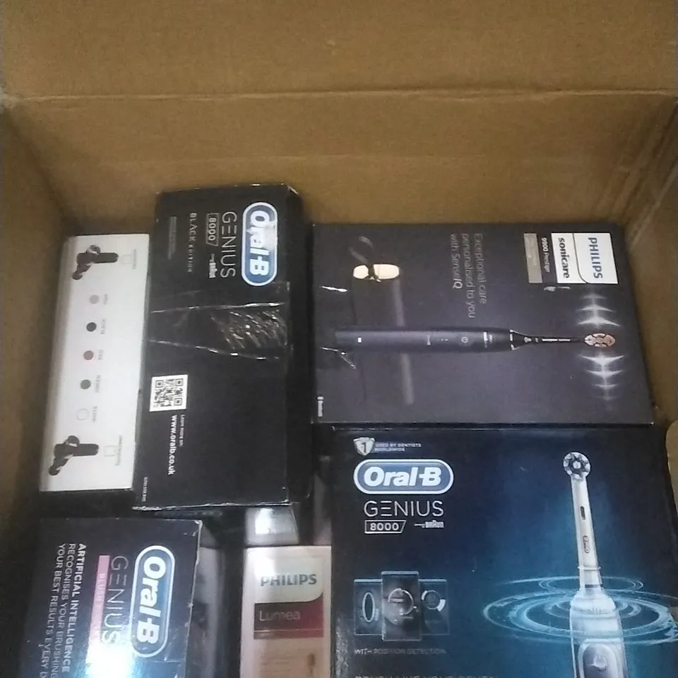 BOX OF ASSORTED ITEMS INCLUDING ORALB/PHILIPS TOOTH BRUSHES AND FASCIA MASSAGER 