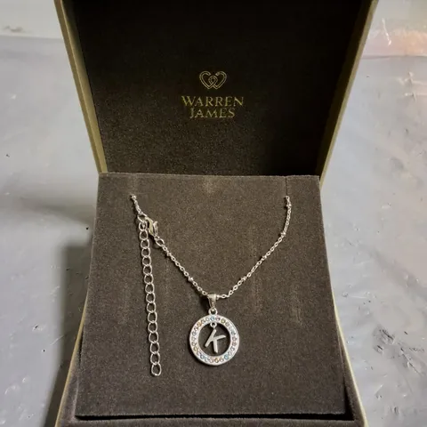 WARREN JAMES CIRCLE SURROUNDED K NECKLACE