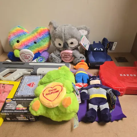 LARGE QUANTITY OF ASSORTED TOYS AND GAMES TO INCLUDE - TEDDIES , WATER GUN AND BISCUIT MOLD