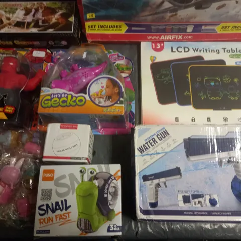 LOT OF APPROXIMATELY 12 ASSORTED TOYS AND GAMES TO INCLUDE ELECTRIC WATER GUN, LCD WRITING TABLET AND LETS GO GECKO