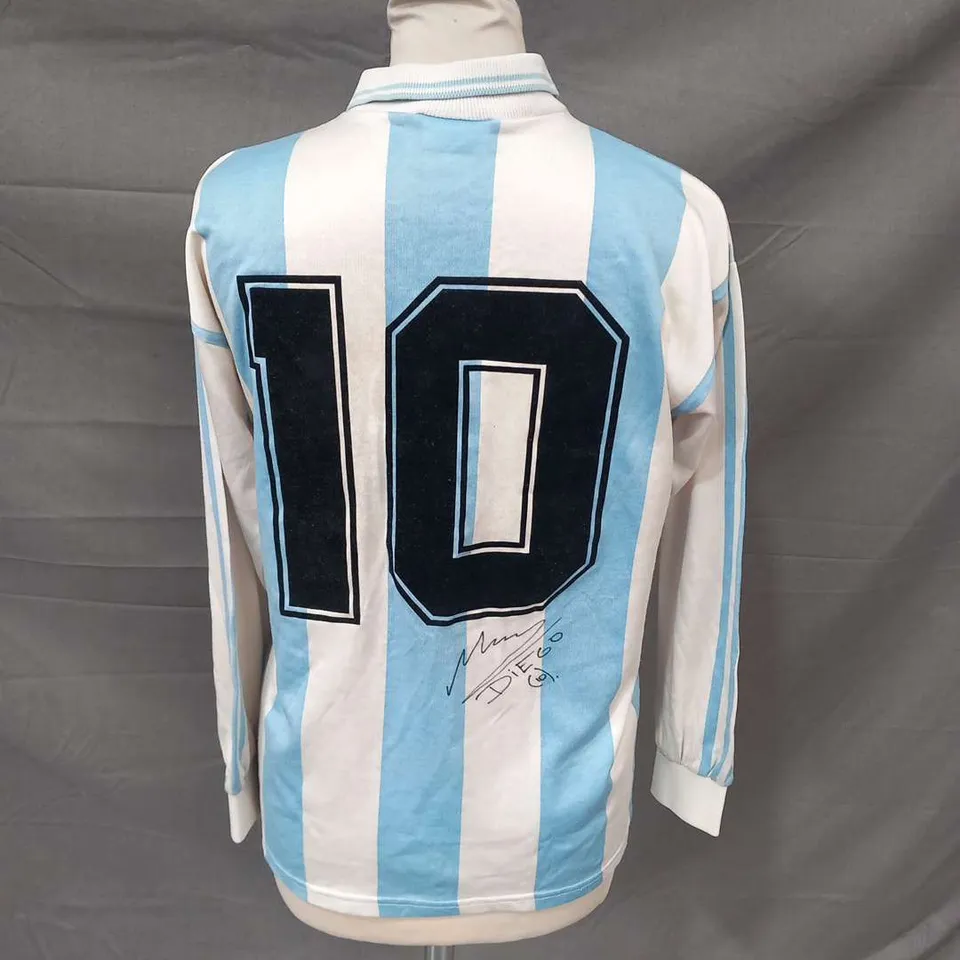 1994 ARGENTINA ADIDAS HOME FOOTBALL JERSEY NUMBERED 10 SIGNED BY DIEGO ARMANDO MARADONA WITH CERTIFICATE OF AUTHENTICITY