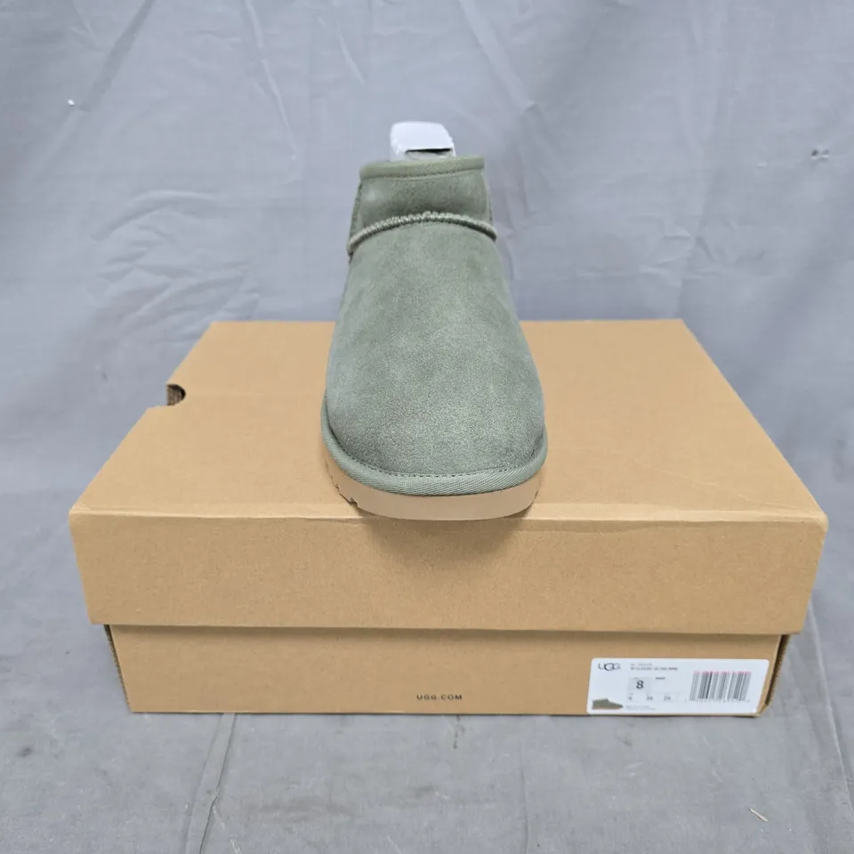 BOXED PAIR OF UGG CLASSIC ULTRA MINI SHOES IN GREEN SIZE UK 6
