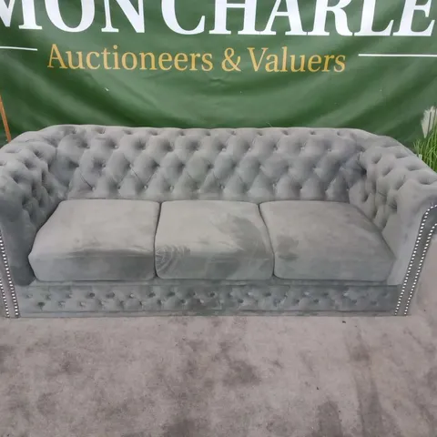 DESIGNER GREY VELVET EFFECT BUTTON BACK THREE SEATER SOFA WITH BUTTON BACK DETAIL