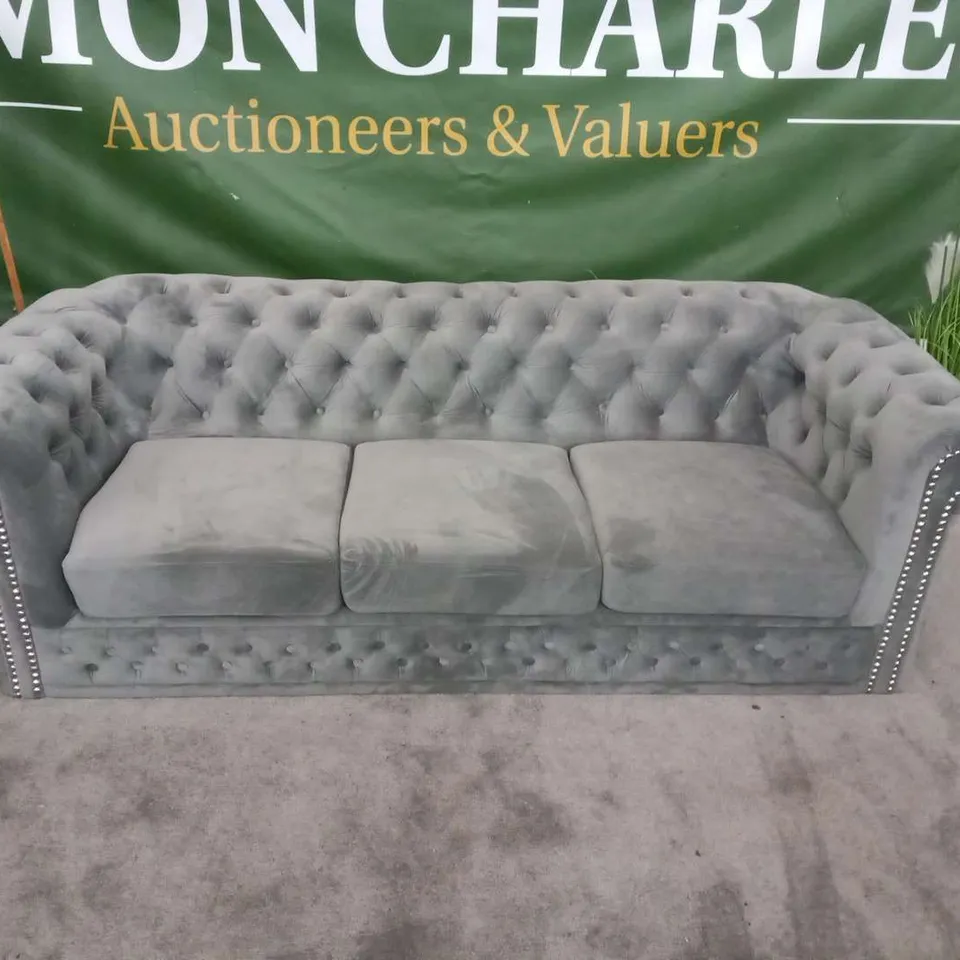 DESIGNER GREY VELVET EFFECT BUTTON BACK THREE SEATER SOFA WITH BUTTON BACK DETAIL