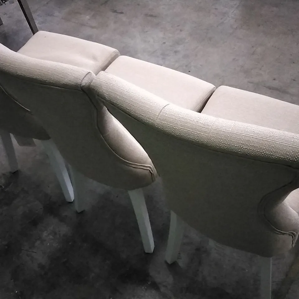 SET OF 3 BEIGE FABRIC BUTTONBACK DINING CHAIRS WITH WHITE WOODEN LEGS 