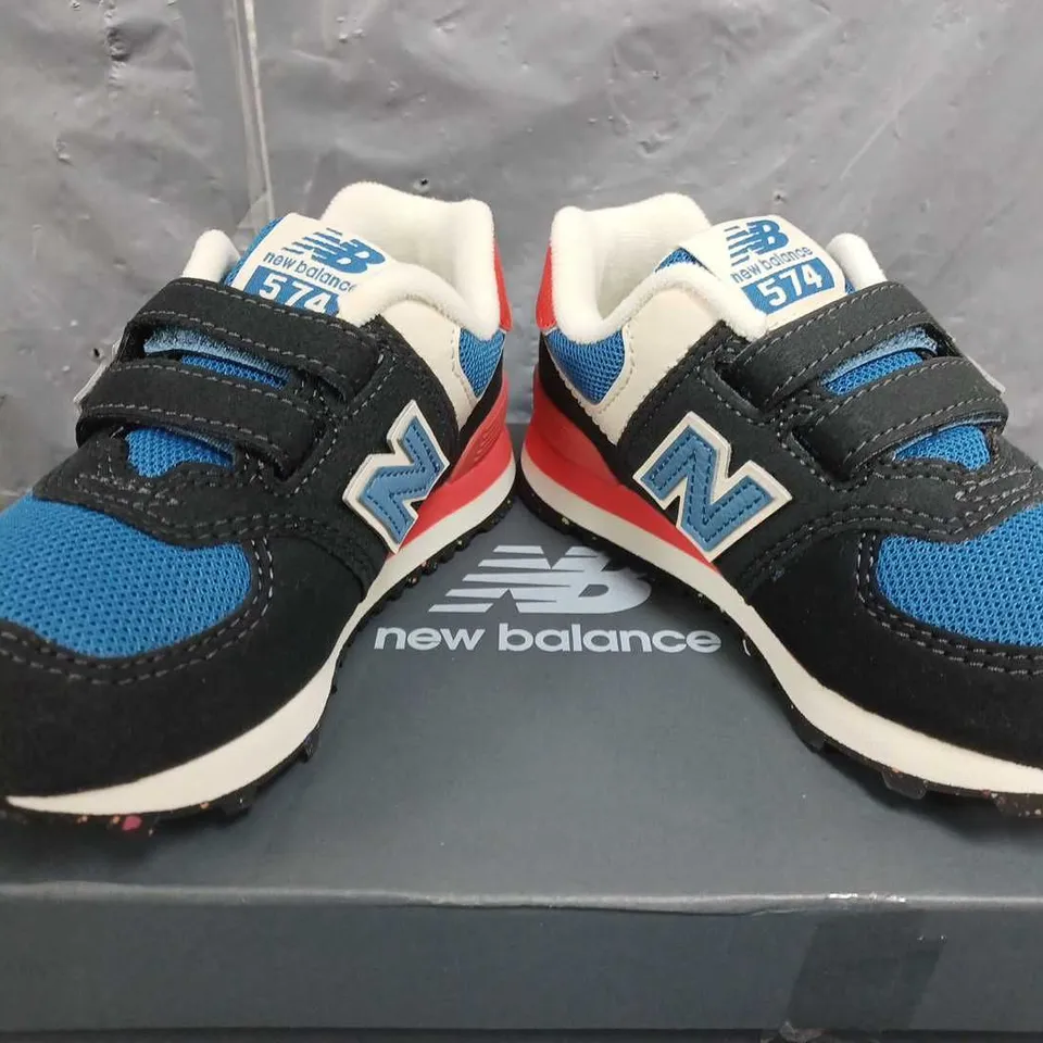 NEW BALANCE BOYS 574 TRAINERS IN BLUE MULTI - UK 10