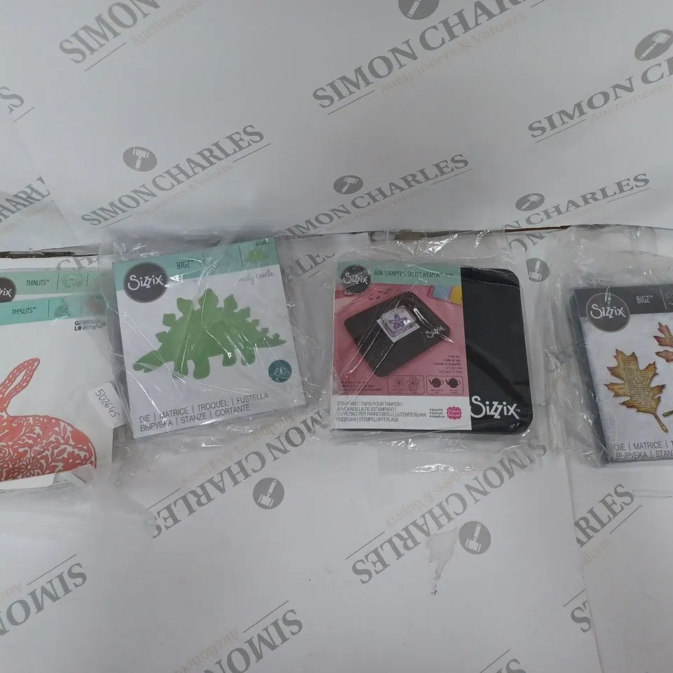 APPROXIMATELY 10 SIZZIX CRAFTING ITEMS TO INCLUDE THINLITS DIE, SEQUIN AND BEADS, AND MINI STAMPERS SECRET WEAPON ETC. 
