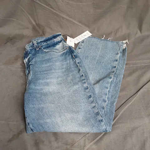 7 FOR ALL MANKIND LOGAN STOVEPIPE JEANS IN LIGHT BLUE SIZE 32