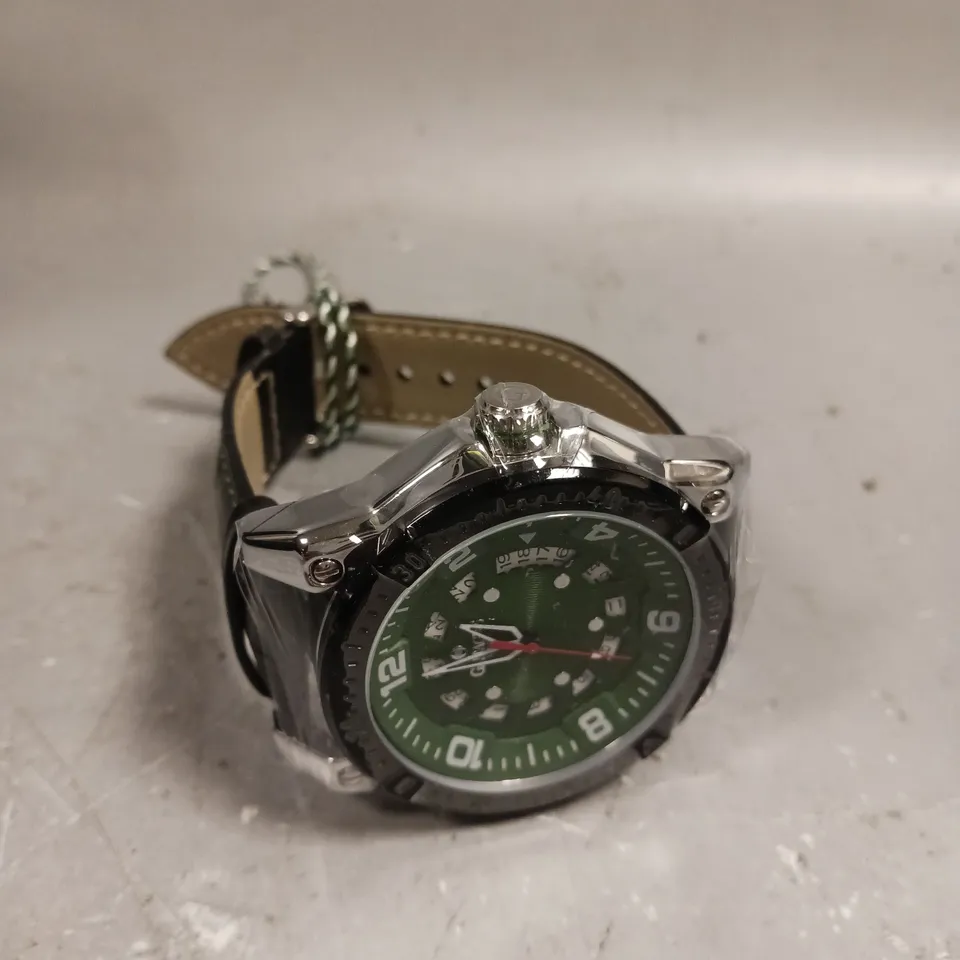 GAMAGES ADVENTURER GREEN DIAL WATCH 