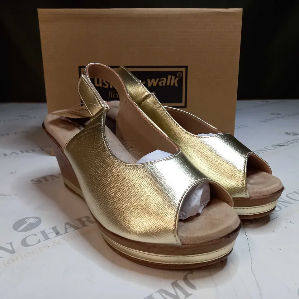 BOXED PAIR OF CUSHION WALK GOLD WEDGE HEEL SHOES IN GOLD - SIZE 5