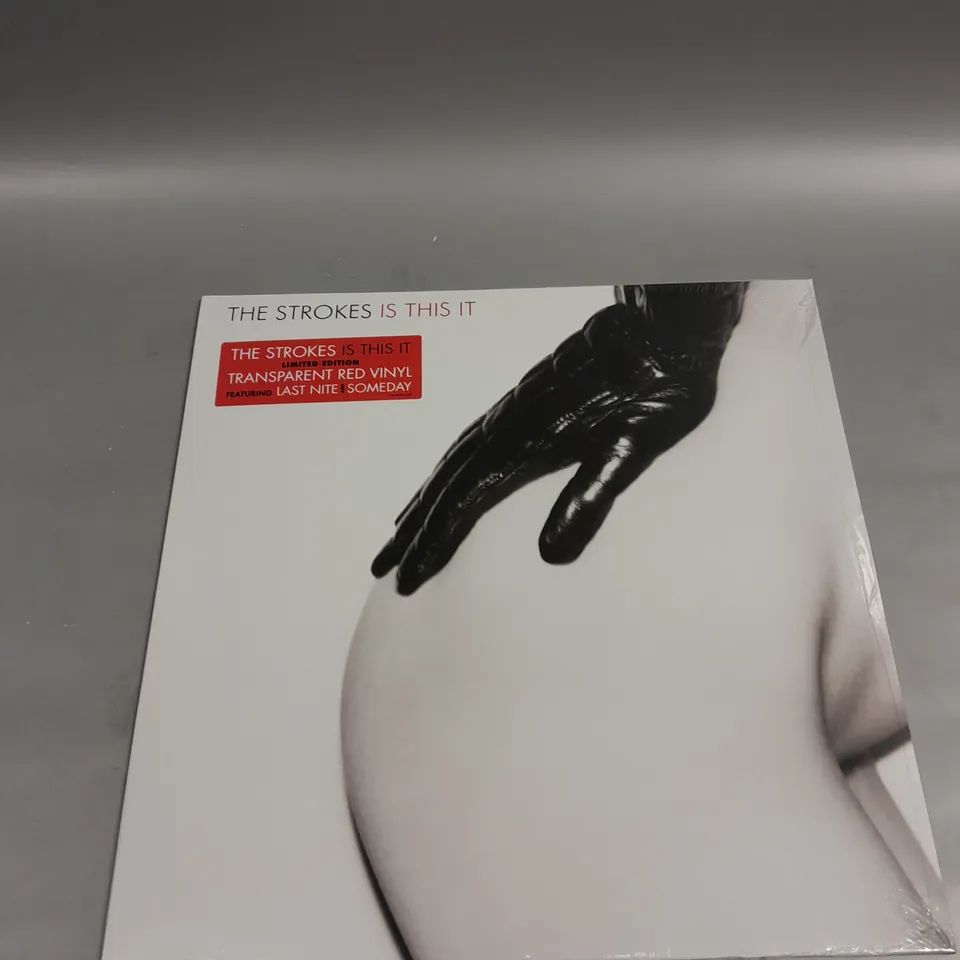 SEALED THE STROKES IS THIS IT VINYL LIMITED EDITION TRANSPARENT RED VINYL 