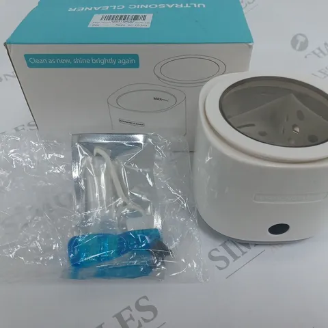 ULTRASONIC DENTURE CLEANER