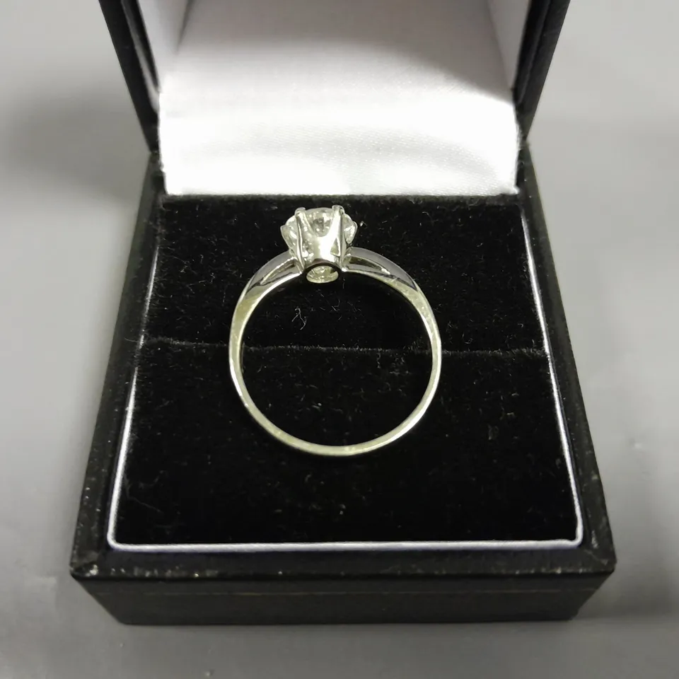 18CT GOLD SOLITAIRE RING SET WITH A NATURAL DIAMOND WEIGHING +-1.23CT