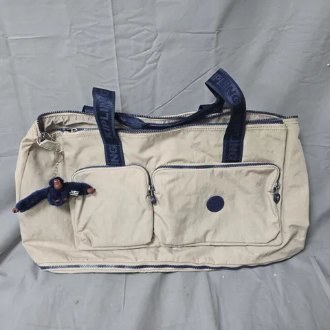 KIPLING BEIGE NYLON TOTE BAG WITH NAVY HANDLES AND MONKEY CHARM