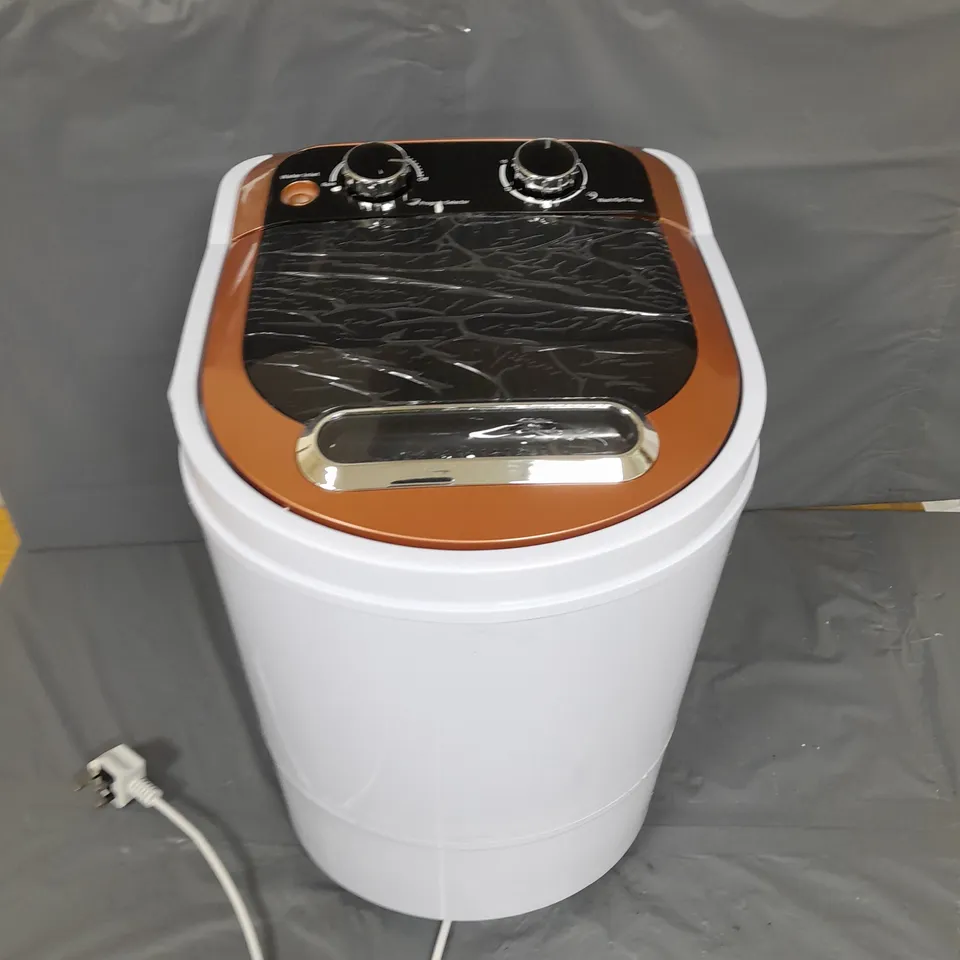 THE SINGLE TUB WASHING MACHINE