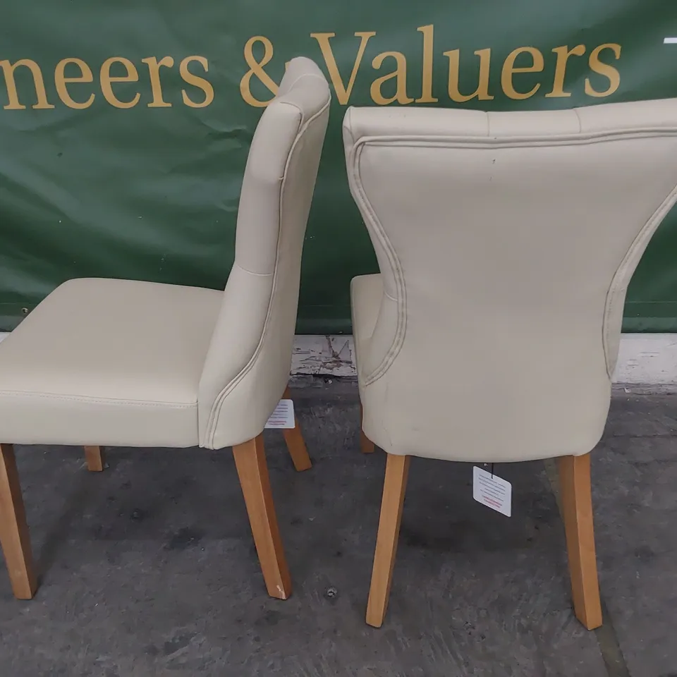 PAIR OF UPHOLSTERED BUTTONED BACK DINING CHAIRS CREAM PU ON NATURAL WOOD LEGS 