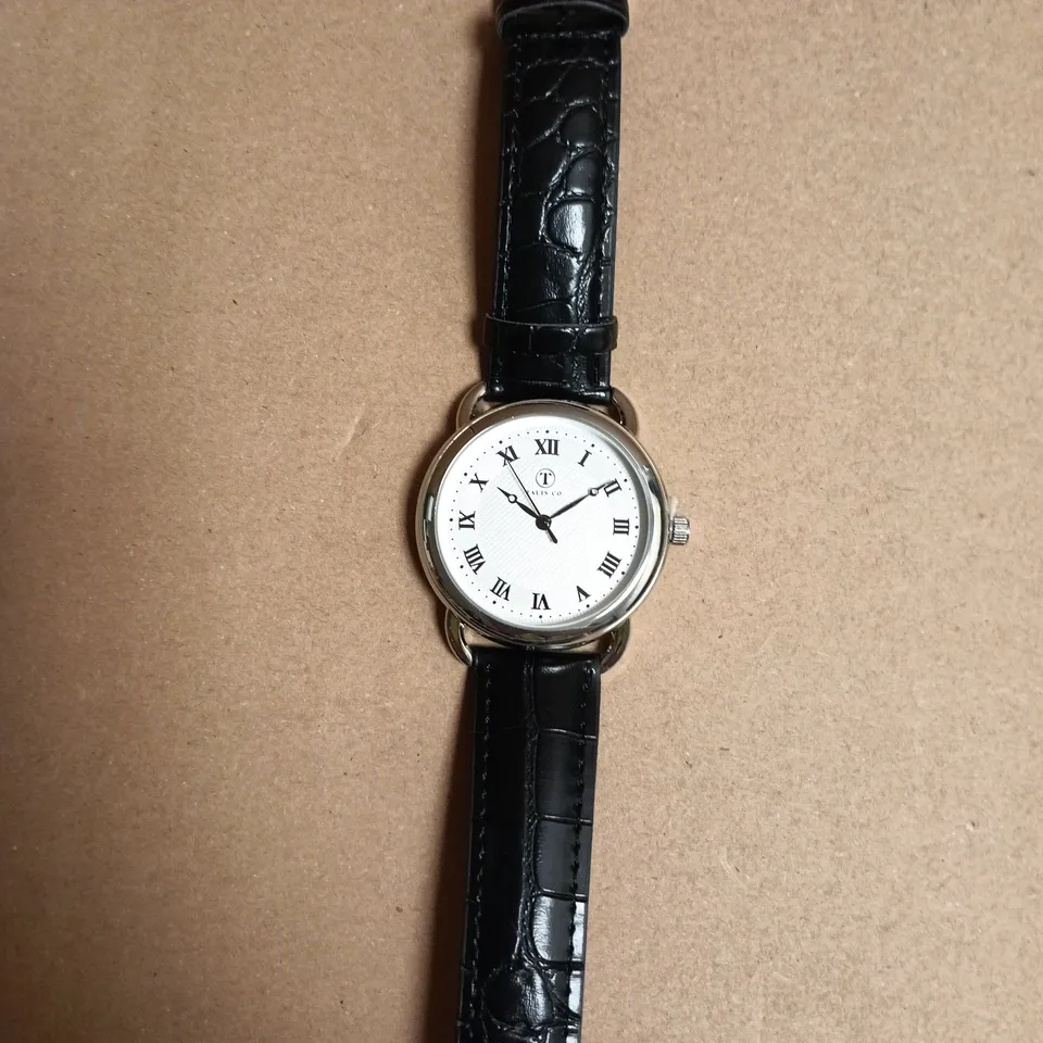 BOXED TALIS CO. WHITE ROMAN DIAL WRISTWATCH WITH BLACK LEATHER STRAP
