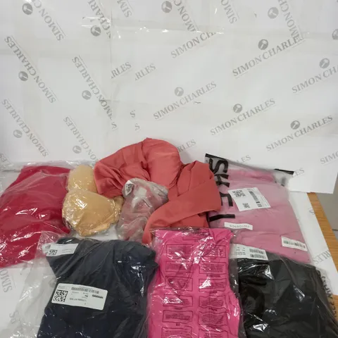 LARGE BOX OF ASSORTED CLOTHING ITEMS IN VARIOUS COLOURS AND SIZES INCLUDING TROUSERS , TOPS AND JUMPERS 