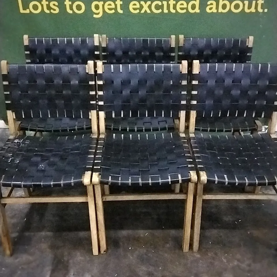 SIX DESIGNER WOODEN FRAMED DINING CHAIRS WITH BLACK WEAVED LEATHER SEAT AND BACK PADS AND STUDDED DETAIL